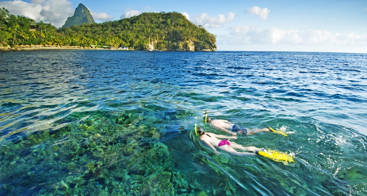 snorkelers at anse chastanet